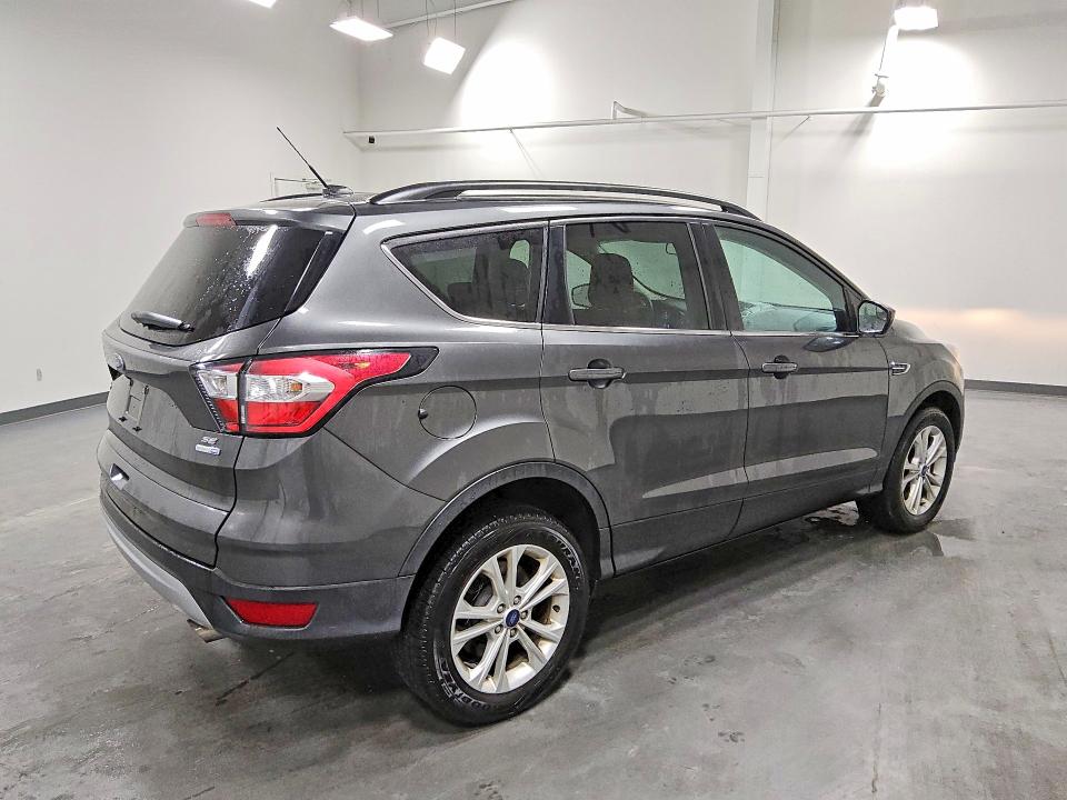2018 Ford Escape VIN 1FMCU9GD1JUC10675 COPART salvage auction — MINOR DENT/SCRATCHES, MA - CERTIFICATE OF TITLE, sold $1,500 on 2026-07-09 (photo 3)