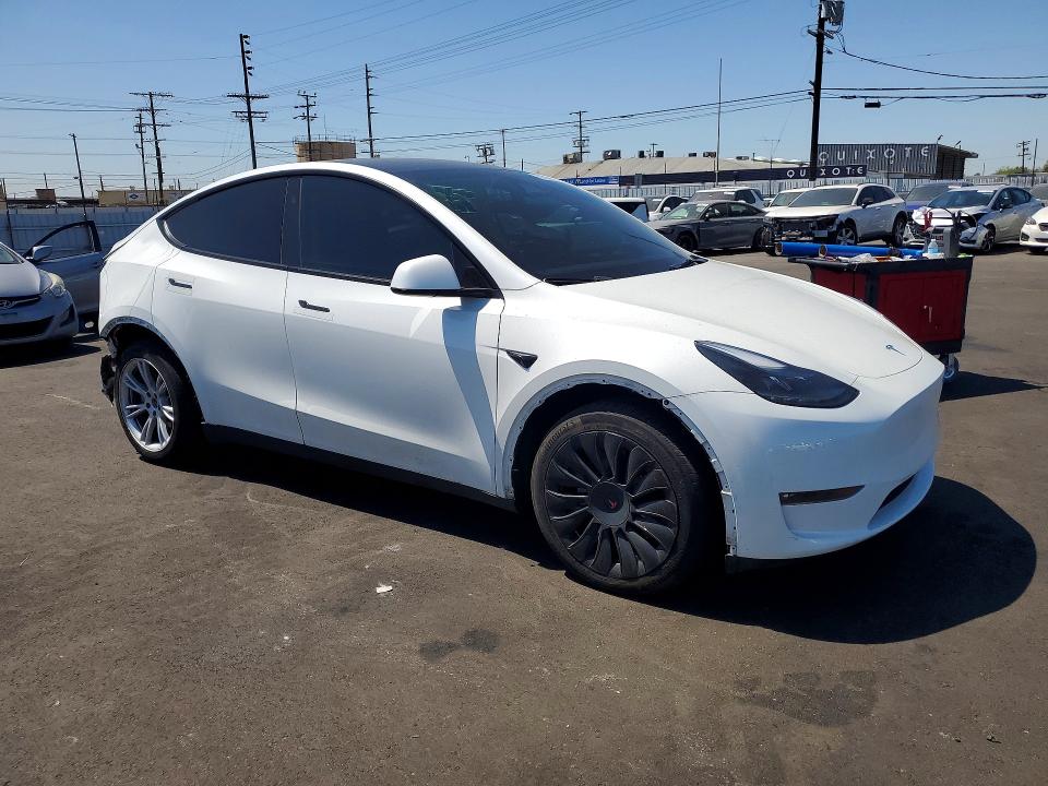 2023 Tesla VIN 7SAYGDEE4PF852893 COPART salvage auction — REAR END, Ca - Salvage Certificate, sold $14,600 on 2026-07-15 (photo 4)