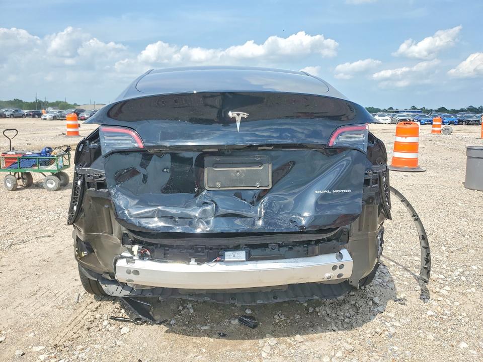 2025 Tesla VIN 7SAYGDEE9SA369468 COPART salvage auction — REAR END, Tx - Salvage Vehicle Title, sold $13,200 on 2026-07-03 (photo 6)