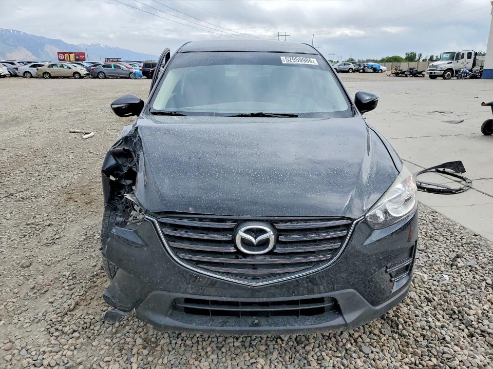 2016 Mazda VIN JM3KE2BY4G0866102 COPART salvage auction — SIDE, Ut - Salvage Certificate, sold $2,200 on 2026-07-27 (photo 5)