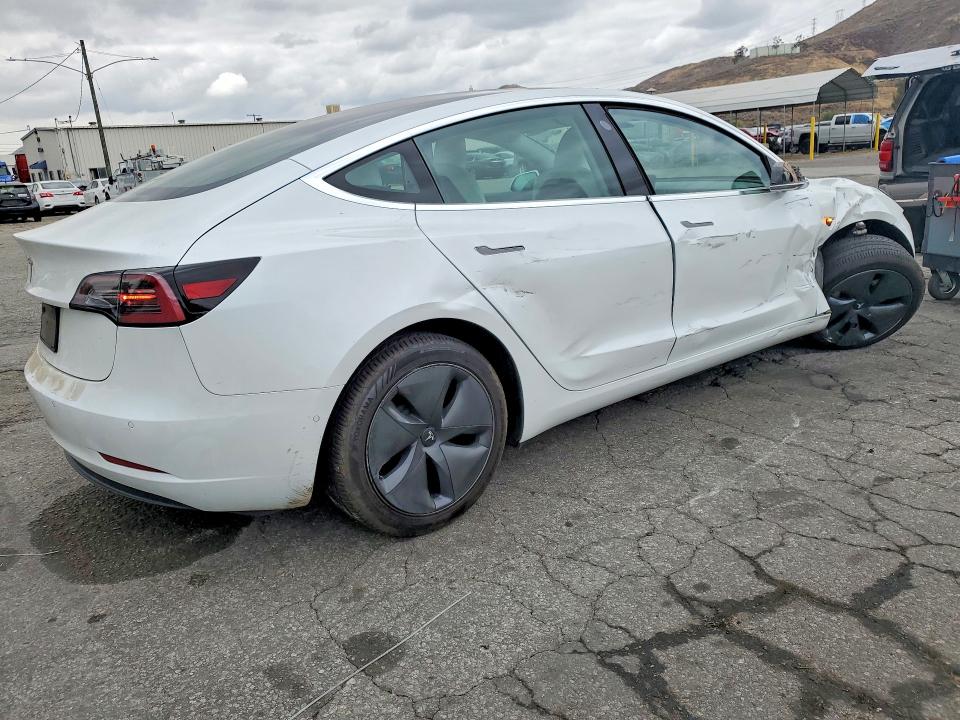 2019 Tesla Model 3 VIN 5YJ3E1EA9KF509546 COPART salvage auction — SIDE, CA - SALVAGE CERTIFICATE, sold $4,400 on 2026-07-16 (photo 3)