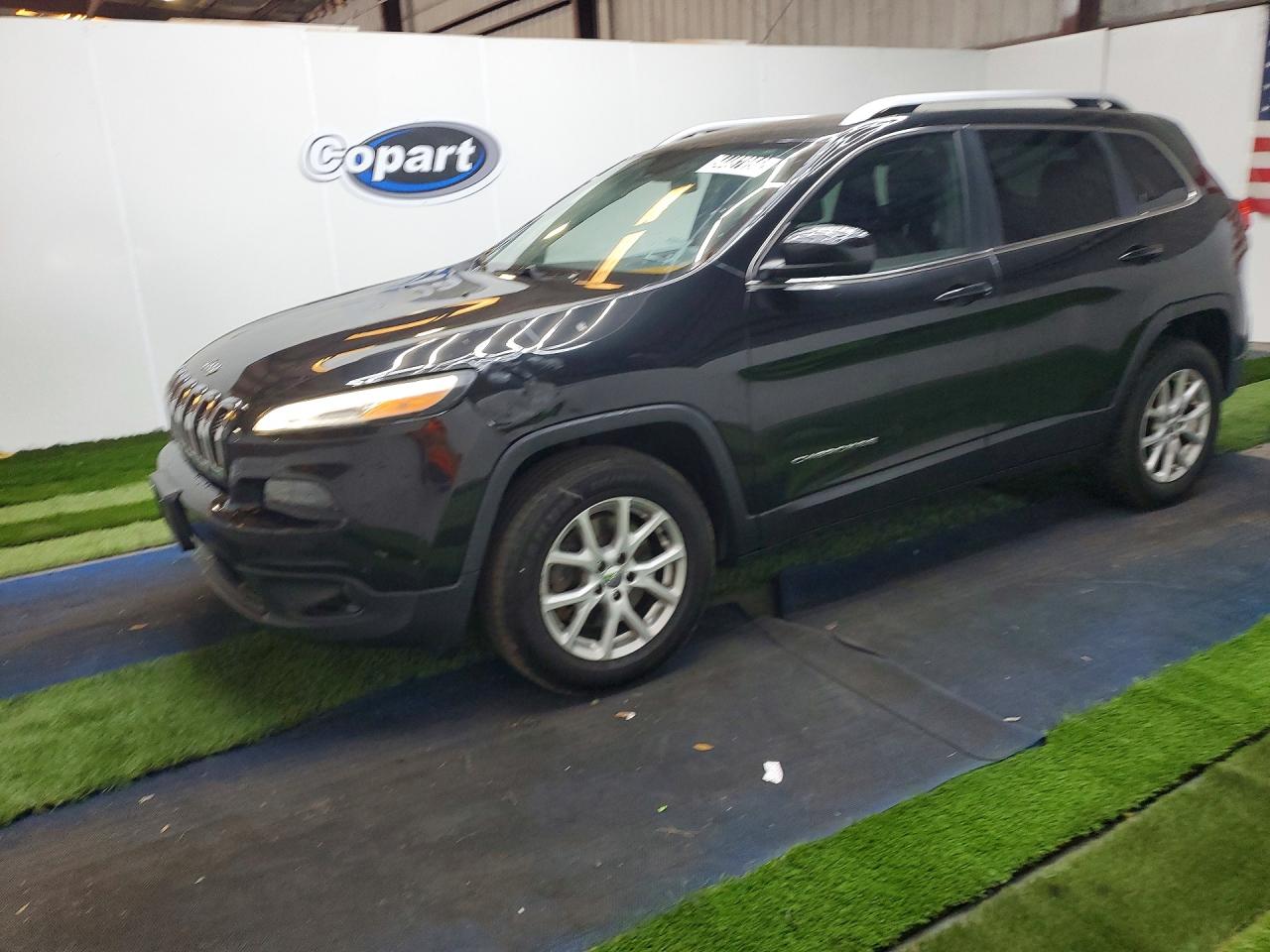 2016 Jeep Cherokee VIN 1C4PJMCB1GW287114 COPART salvage auction — Normal Wear, FL - CERTIFICATE OF TITLE, sold $2,900 on 2026-07-09 (photo 1)