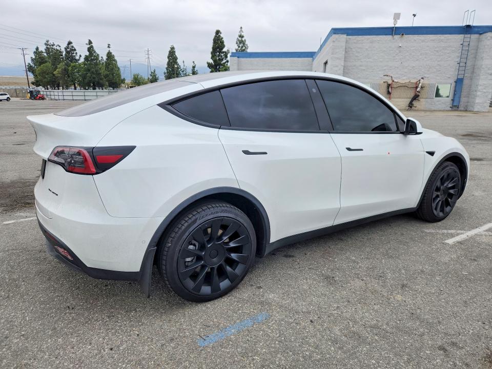 2021 Tesla Model y VIN 5YJYGDEE7MF299987 COPART salvage auction — SIDE, CA - SALVAGE CERTIFICATE, sold $150 on 2026-07-21 (photo 3)