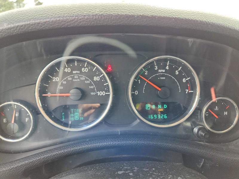 2014 Jeep VIN 1C4BJWDG5EL145797 COPART salvage auction — SIDE, Wa - Vehicle Cert Of Ownership-Titl, sold $5,200 on 2026-07-10 (photo 9)