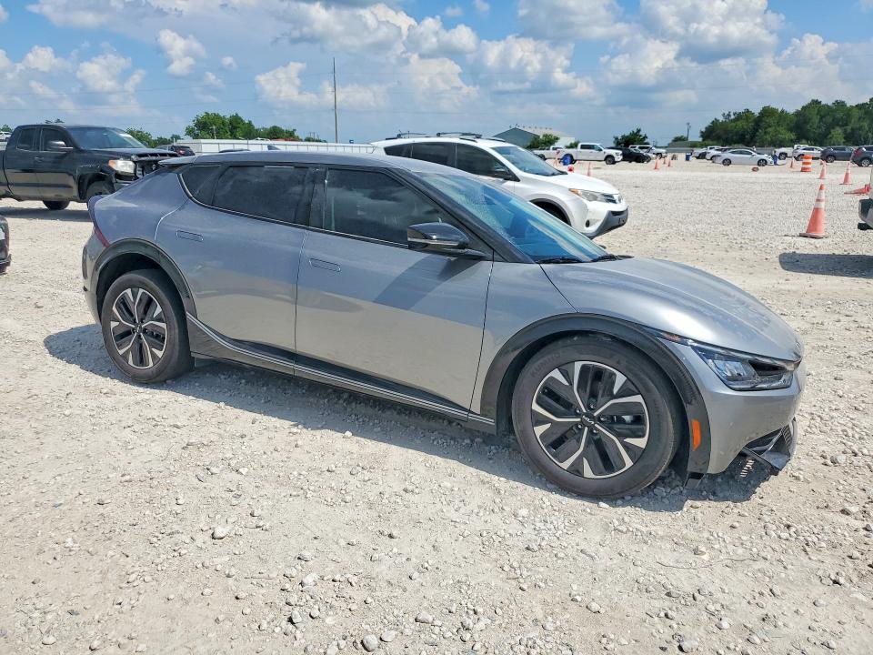 2023 Kia VIN KNDC34LAXP5607696 COPART salvage auction — SIDE, Tx - Salvage Vehicle Title, sold $4,750 on 2026-07-09 (photo 4)