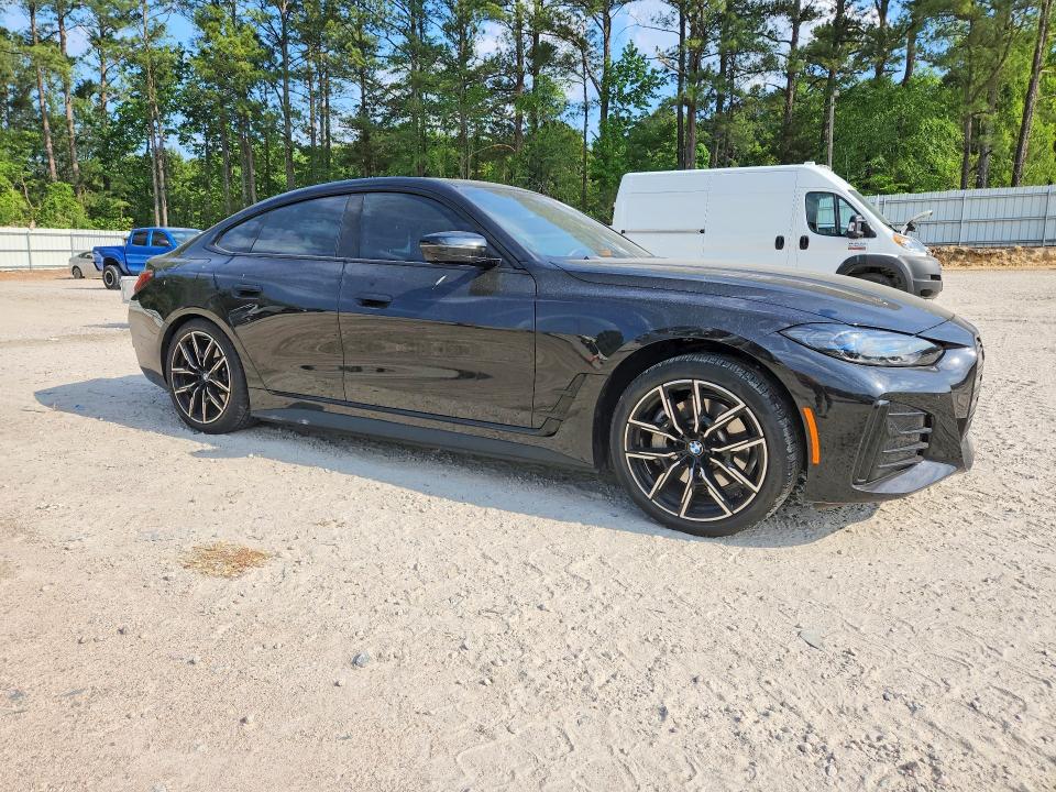 2022 BMW I4 VIN WBY73AW01NFN10167 COPART salvage auction — SIDE, Nc - Salvage Certificate Of Title, sold $17,700 on 2026-07-06 (photo 4)