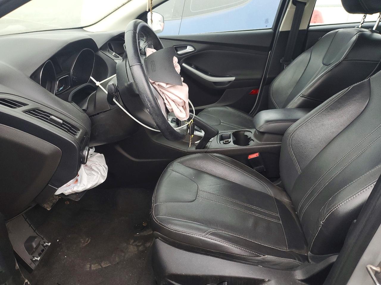 2014 Ford Focus VIN 1FADP3F20EL288637 COPART salvage auction — Front End, MO - SALVAGE CERTIFICATE OF TITLE, sold $425 on 2026-06-25 (photo 7)