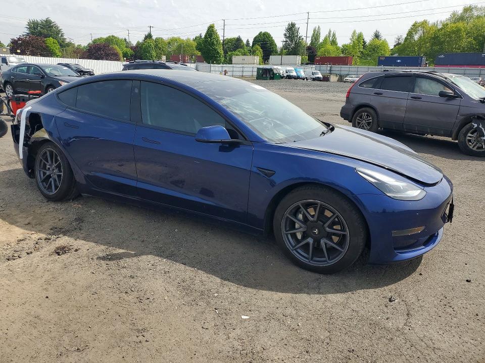 2023 Tesla Model 3 VIN 5YJ3E1EA5PF677577 COPART salvage auction — SIDE, Or - Salvage Title Certificate, sold $8,200 on 2026-07-22 (photo 4)