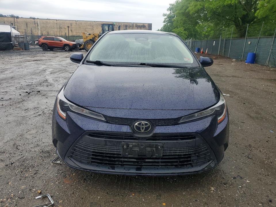 2023 Toyota Corolla VIN JTDB4MEEXPJ000391 COPART salvage auction — SIDE, Salvage Title, sold $4,250 on 2026-07-09 (photo 5)