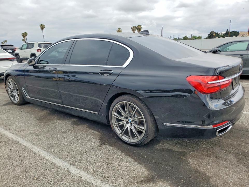 2016 BMW 7er VIN WBA7E2C52GG738741 COPART salvage auction — SIDE, Salvage Title, sold $8,100 on 2026-08-04 (photo 2)