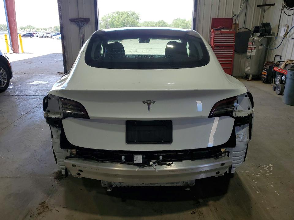 2022 Tesla Model 3 VIN 5YJ3E1EA2NF112071 COPART salvage auction — REAR END, MT - SALVAGE CERTIFICATE OF A VEHIC, sold $5,200 on 2026-08-03 (photo 6)