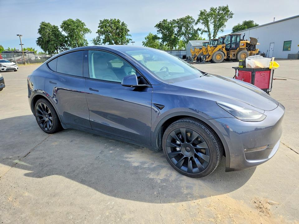 2022 Tesla Model y VIN 7SAYGDEE9NF569774 COPART salvage auction — REAR END, CA - SALVAGE CERTIFICATE, sold $11,400 on 2026-07-06 (photo 4)