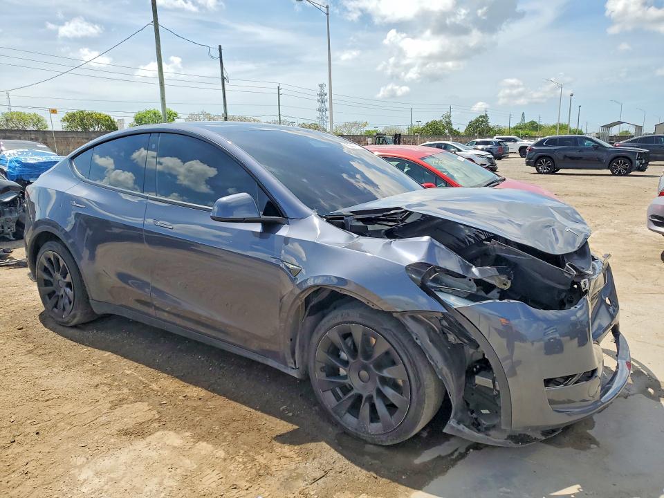 2023 Tesla Model y VIN 7SAYGDEE5PF629696 COPART salvage auction — FRONT END, FL - CERTIFICATE OF TITLE, sold $7,200 on 2026-07-16 (photo 4)