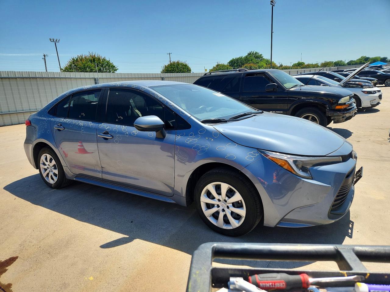 2026 Toyota Corolla VIN JTDBCMFE8T3113336 COPART salvage auction — Rear End, TX - SALVAGE VEHICLE TITLE, sold $11,700 on 2026-07-09 (photo 4)