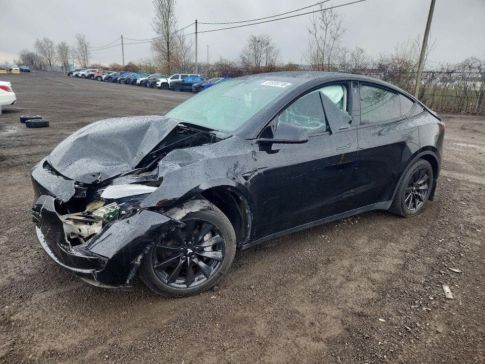 2023 Tesla Model y VIN LRWYGDFD4PC939125 COPART salvage auction — FRONT END, Qc - Gravement Accidente, sold $6,800 on 2026-07-07 (photo 1)