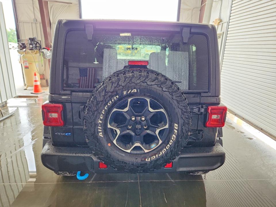 2023 Jeep Wrangler / VIN 1C4JJXR65PW621310 COPART salvage auction — MINOR DENT/SCRATCHES, Il - Certificate Of Title, sold $21,750 on 2026-07-02 (photo 6)