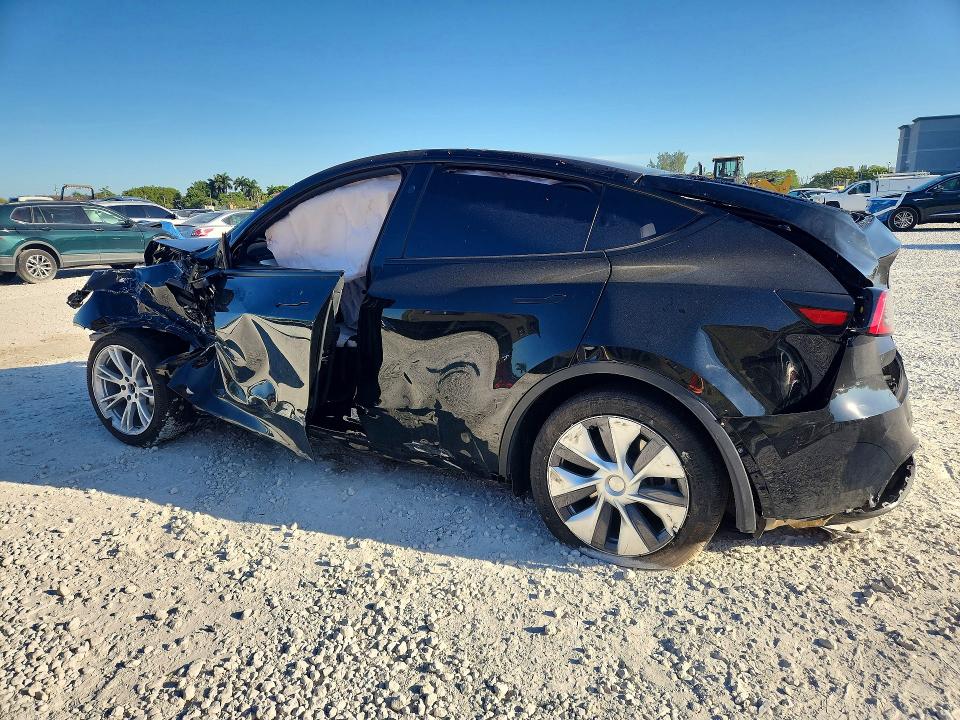 2024 Tesla Model y VIN 7SAYGDED7RF095045 COPART salvage auction — ALL OVER, Fl - Certificate Of Destruction, sold $3,150 on 2026-07-31 (photo 2)