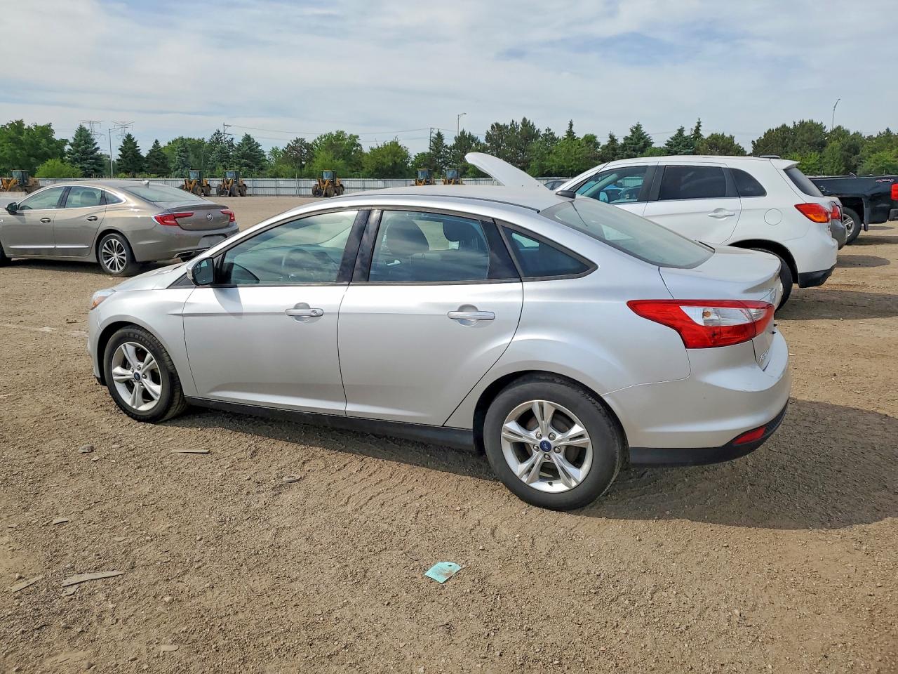 2014 Ford Focus VIN 1FADP3F25EL410991 COPART salvage auction — Side, IL - SALVAGE CERTIFICATE, sold $725 on 2026-06-30 (photo 2)