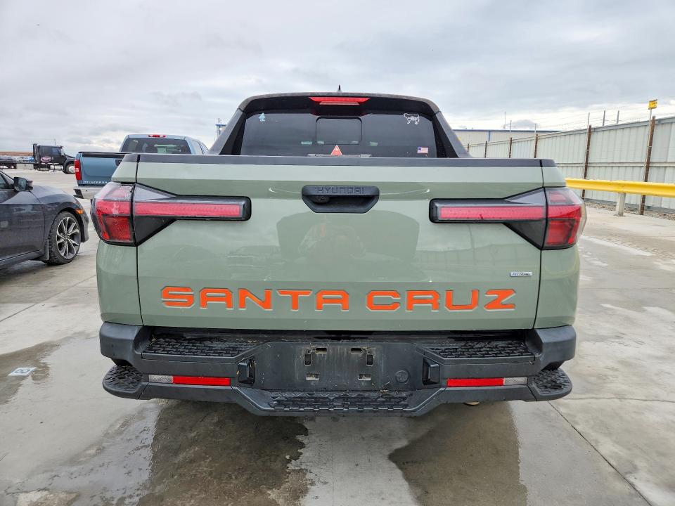 2022 Hyundai Santa cruz VIN 5NTJCDAE7NH030167 COPART salvage auction — HAIL, Tx - Certificate Of Title, sold $11,400 on 2026-07-14 (photo 6)
