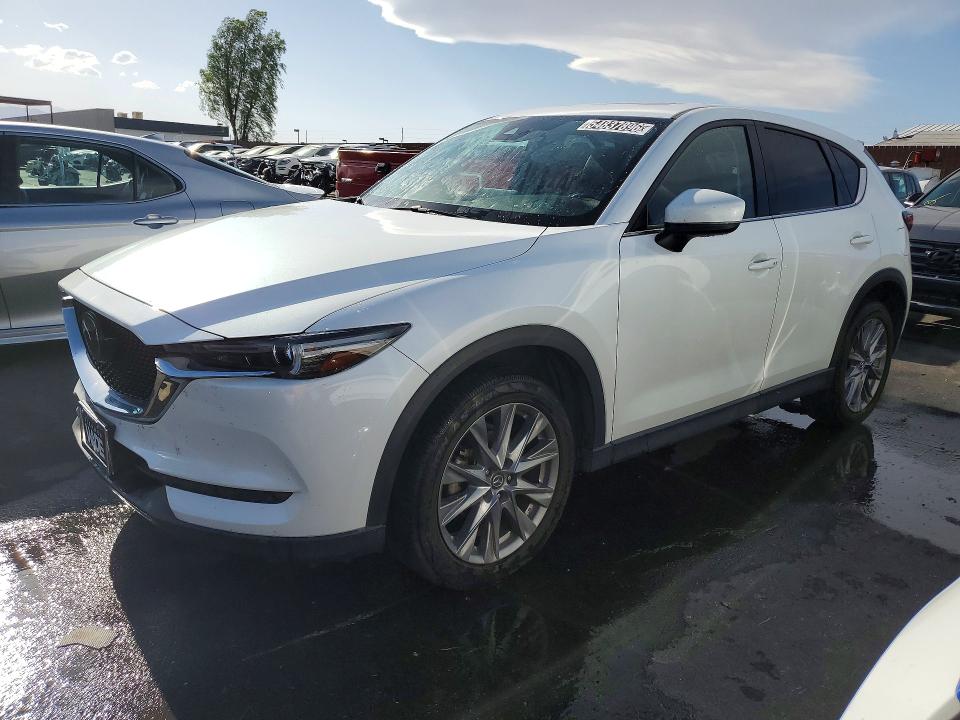 2021 Mazda Cx-5 VIN JM3KFBDM7M0455277 COPART salvage auction — MINOR DENT/SCRATCHES, UT - CERTIFICATE OF TITLE, sold $850 on 2026-07-09 (photo 1)