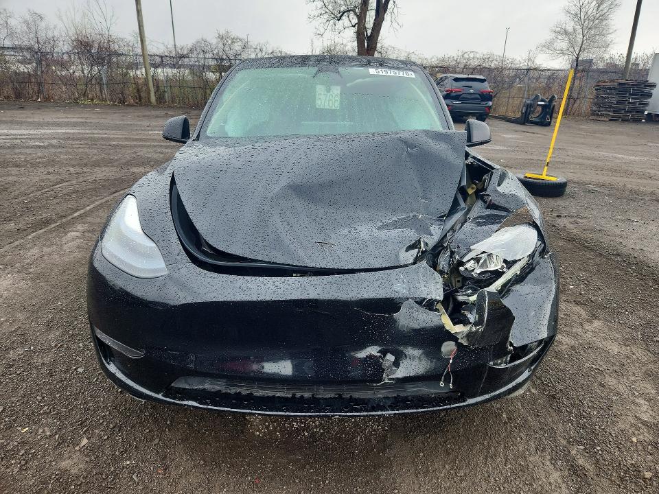 2023 Tesla Model y VIN LRWYGDFD4PC939125 COPART salvage auction — FRONT END, Qc - Gravement Accidente, sold $6,800 on 2026-07-07 (photo 5)