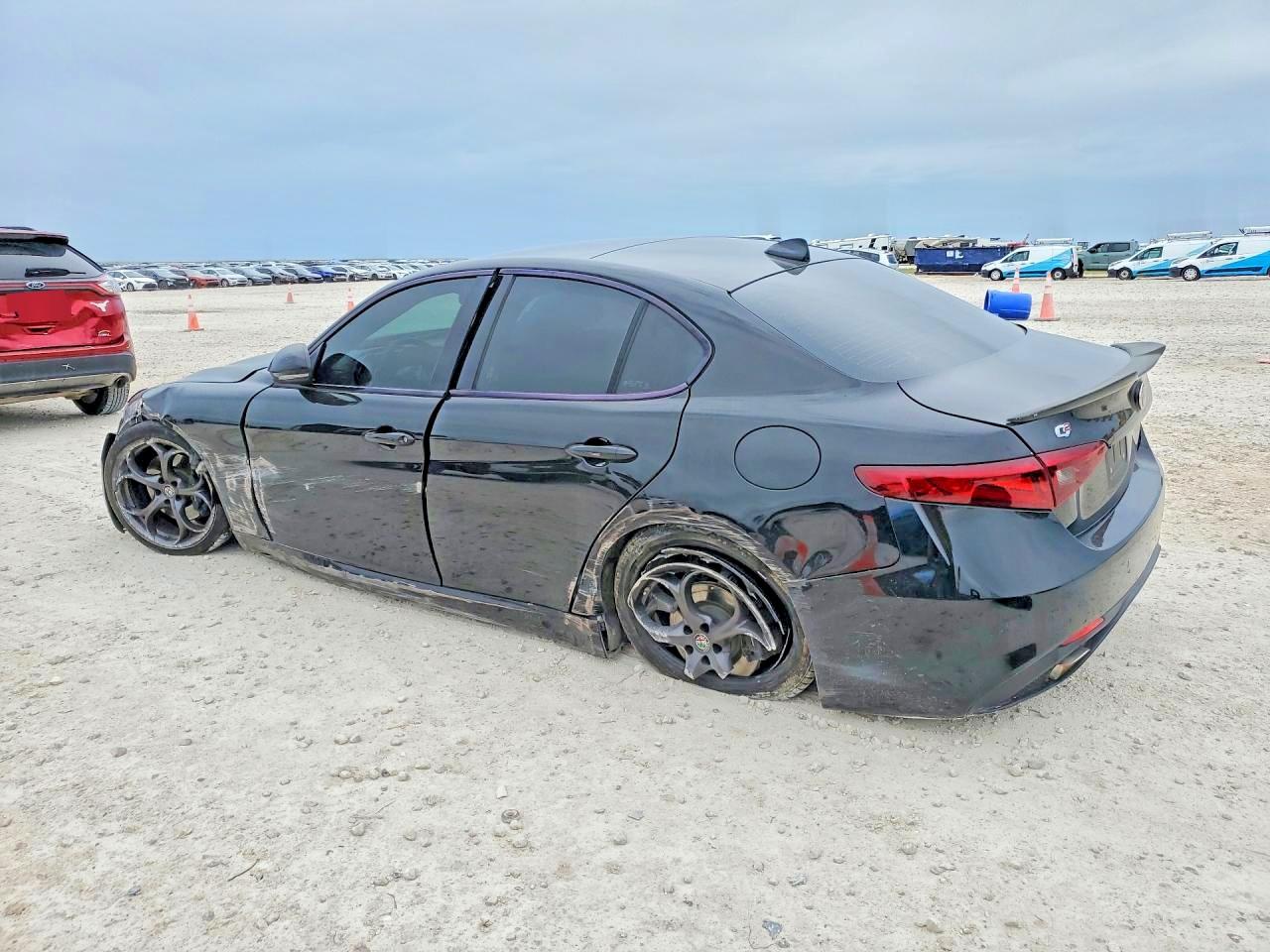 2018 Alfa Romeo Giulia VIN ZARFAECN8J7599479 COPART salvage auction — Side, TX - SALVAGE VEHICLE TITLE, sold $2,200 on 2026-07-09 (photo 2)