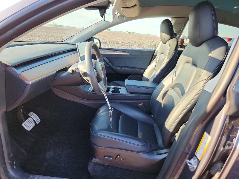 2022 Tesla Model y VIN 7SAYGDEF5NF549207 COPART salvage auction — HAIL, Mo - Certificate Of Title, sold $16,600 on 2026-07-22 (photo 7)