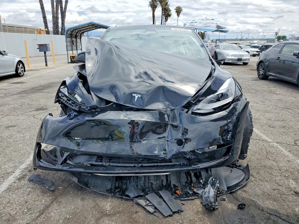2024 Tesla Model y VIN 7SAYGDEF3RF053392 COPART salvage auction — FRONT END, Ca - Salvage Certificate, sold $8,200 on 2026-07-28 (photo 5)