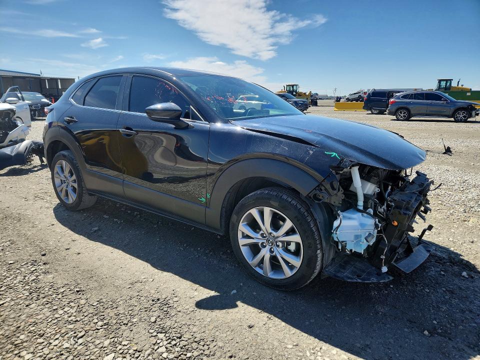 2021 Mazda VIN 3MVDMBCL1MM312028 COPART salvage auction — FRONT END, Wy - Dis/Dlr/Exp Only Salvage Title, sold $4,900 on 2026-08-29 (photo 4)
