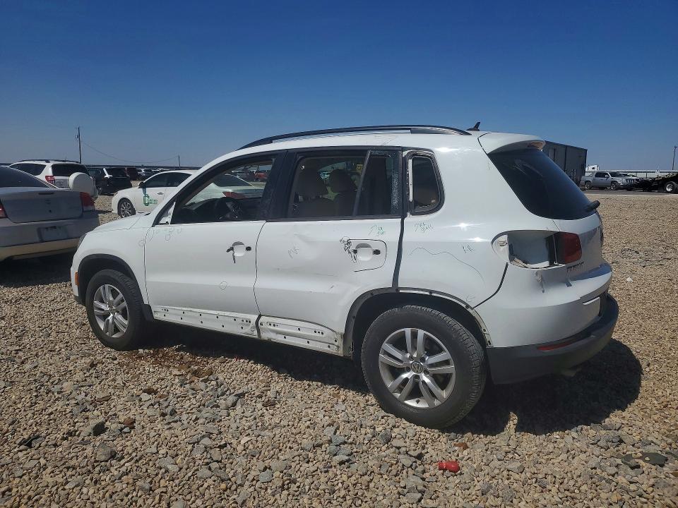 2016 Volkswagen Tiguan VIN WVGAV7AX5GW530705 COPART salvage auction — SIDE, Tx - Salvage Vehicle Title, sold $2,100 on 2026-07-07 (photo 2)