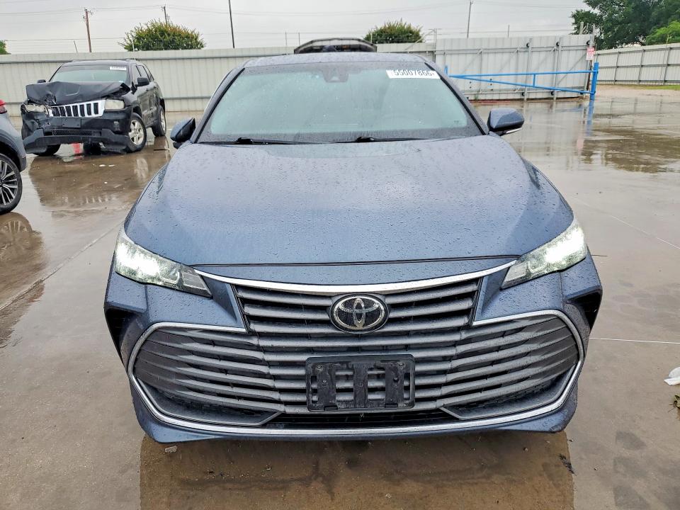2022 Toyota Avalon VIN 4T1JZ1FB2NU087095 COPART salvage auction — SIDE, TX - SALVAGE VEHICLE TITLE (P), sold $9,700 on 2026-07-23 (photo 5)