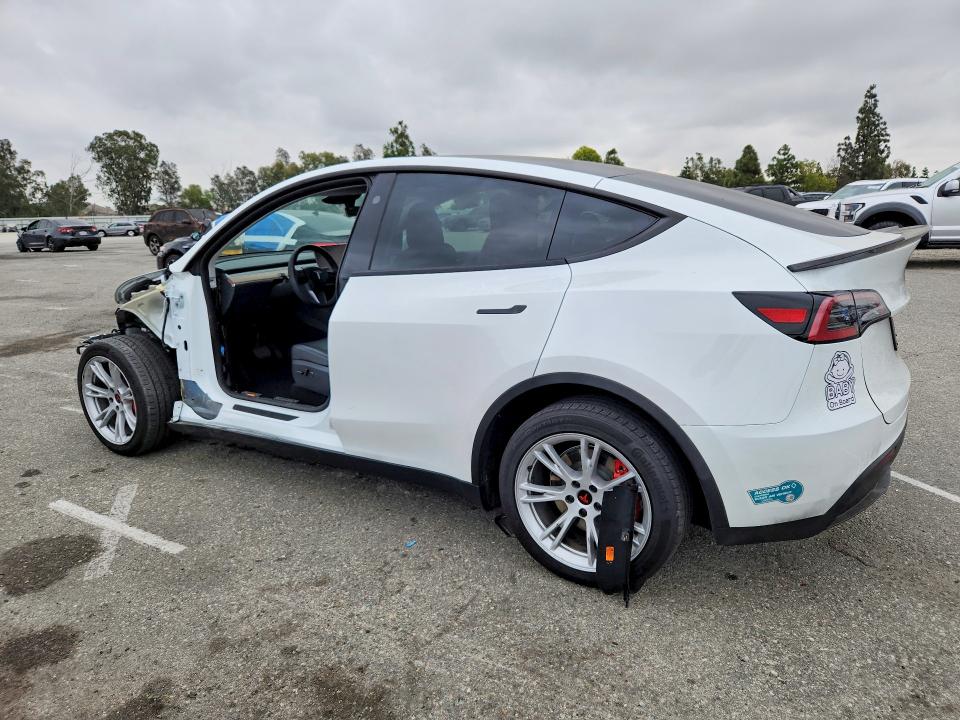 2024 Tesla Model y VIN 7SAYGDEE9RF075162 COPART salvage auction — SIDE, CA - SALVAGE CERTIFICATE, sold $150 on 2026-07-21 (photo 2)