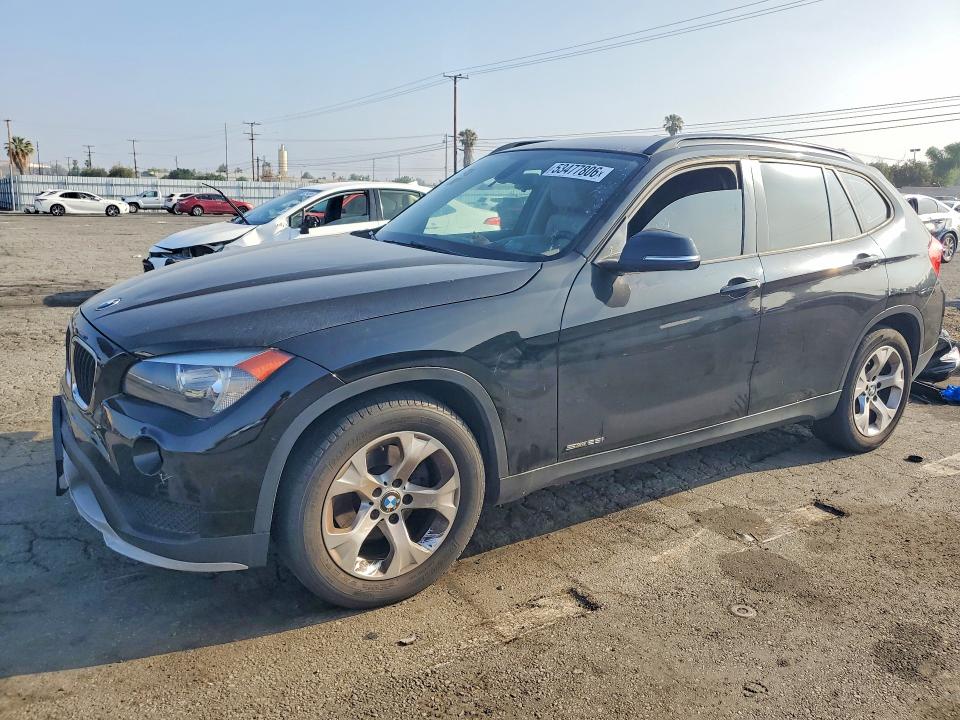 2015 BMW X1 VIN WBAVM1C51FV316023 COPART salvage auction — MINOR DENT/SCRATCHES, Ca - Dis/Dlr/Exp Only Clean Title, sold $1,350 on 2026-07-27 (photo 1)