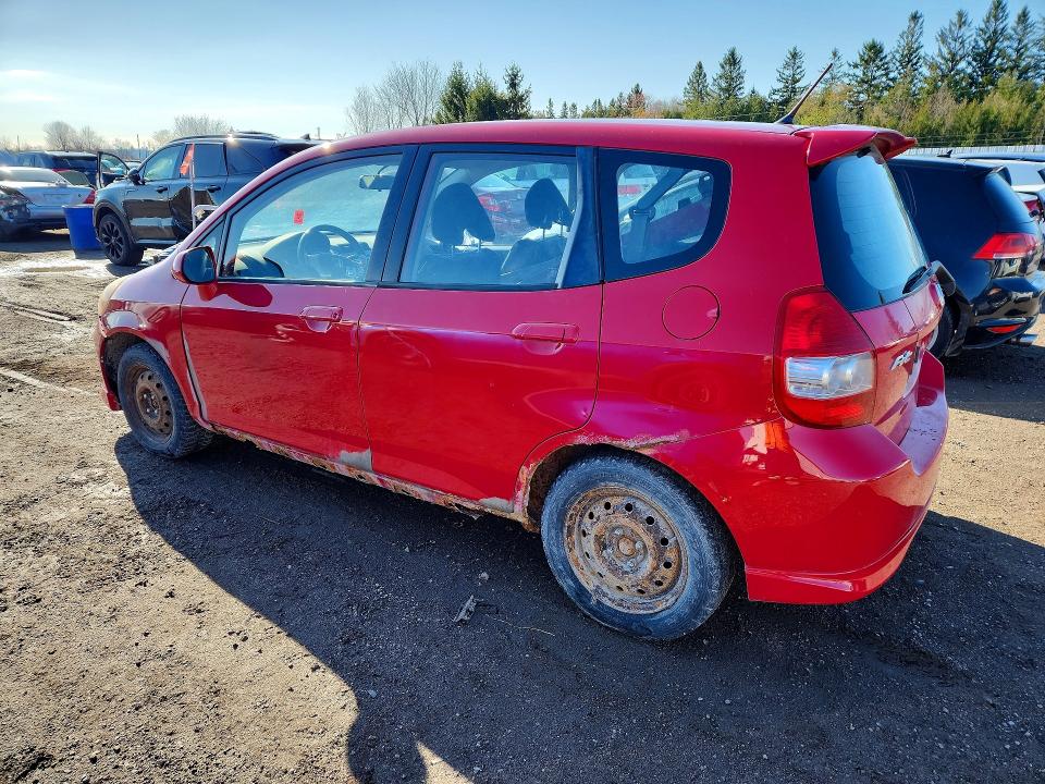 2007 Honda Fit VIN JHMGD38687S819235 COPART salvage auction — SIDE, On - Permit Rebuilt - Unfit, sold $375 on 2026-07-28 (photo 2)