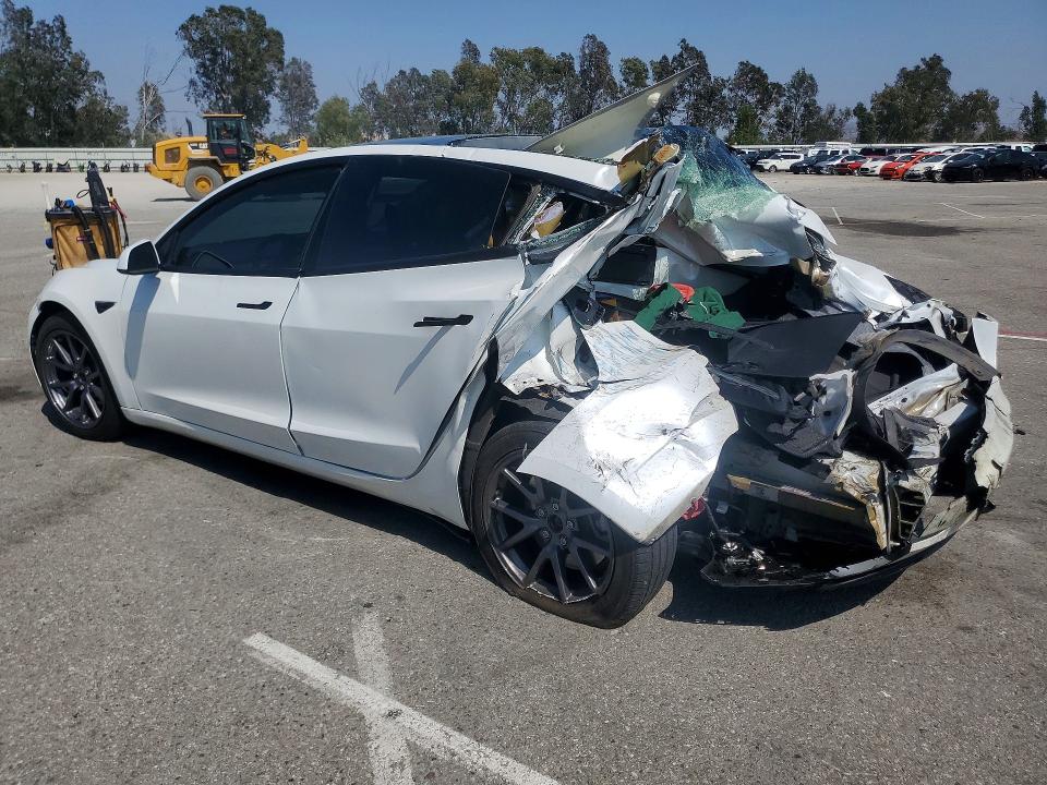 2023 Tesla Model 3 VIN 5YJ3E1EA0PF665515 COPART salvage auction — ALL OVER, CA - SALVAGE CERTIFICATE, sold $4,150 on 2026-07-16 (photo 2)