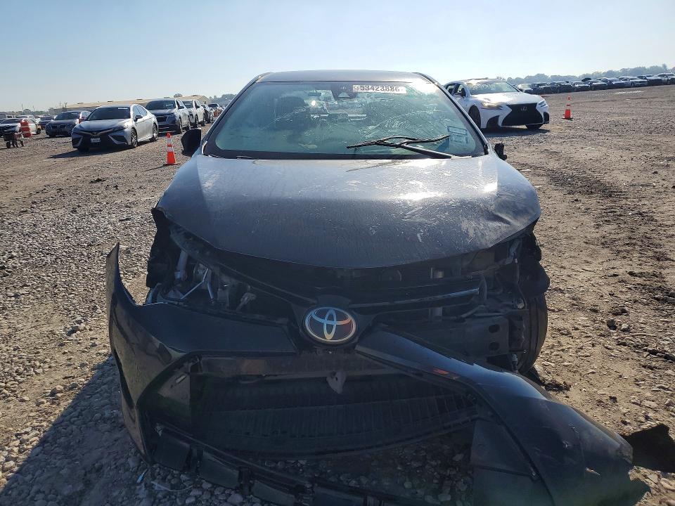 2018 Toyota Corolla VIN 5YFBURHE7JP840821 COPART salvage auction — ALL OVER, TX - CERTIFICATE OF TITLE, sold $1,250 on 2026-07-21 (photo 5)