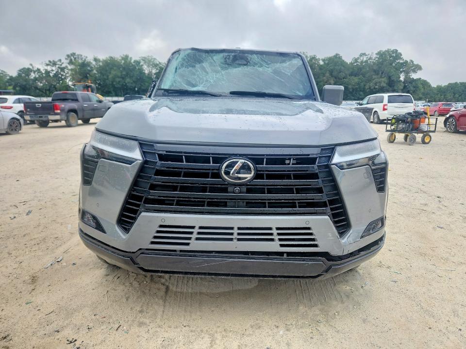 2024 Lexus VIN JTJVBCDX1R5002183 COPART salvage auction — SIDE, Fl - Cert Of Title Slvg Rebuildable, sold $35,750 on 2026-07-14 (photo 5)