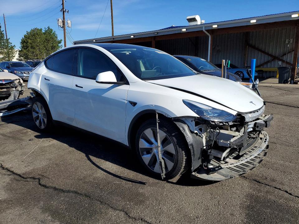 2023 Tesla Model y VIN 7SAYGDEE9PF840139 COPART salvage auction — FRONT END, Co - Salvage Title, sold $11,700 on 2026-07-16 (photo 4)