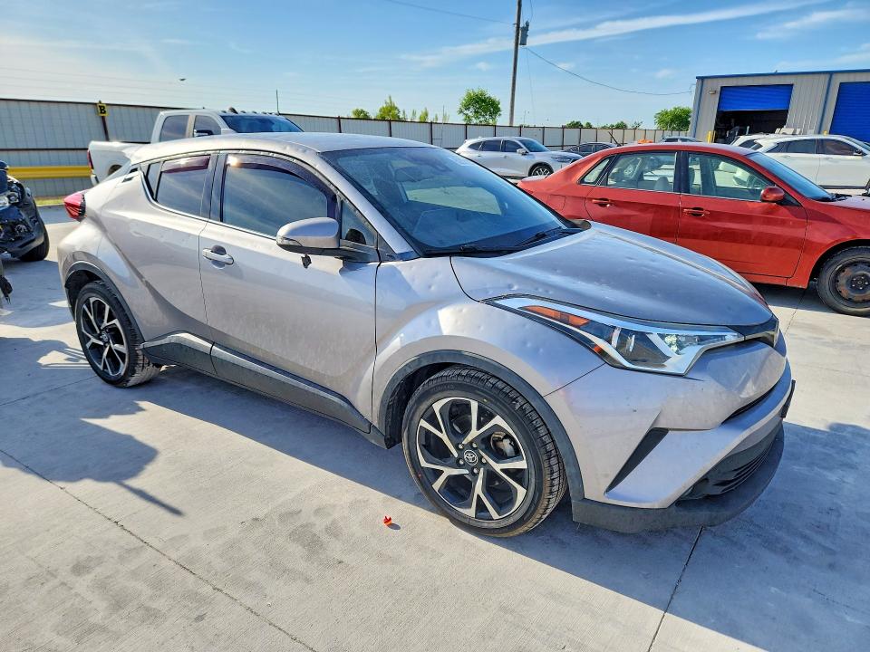 2019 Toyota C-hr VIN JTNKHMBX1K1028756 COPART salvage auction — HAIL, Tx - Salvage Vehicle Title, sold $4,900 on 2026-07-31 (photo 4)