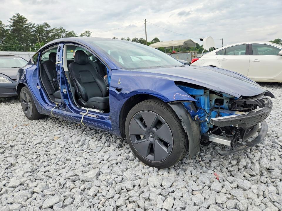 2023 Tesla Model 3 VIN 5YJ3E1EA0PF650979 COPART salvage auction — SIDE, Ga - Cert Of Title-Salvage, sold $7,300 on 2026-07-07 (photo 4)