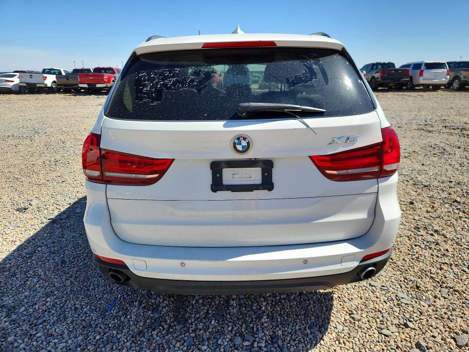 2014 BMW X5 VIN 5UXKR2C52E0H31314 COPART salvage auction — MINOR DENT/SCRATCHES, Tx - Certificate Of Title, sold $3,250 on 2026-07-07 (photo 6)