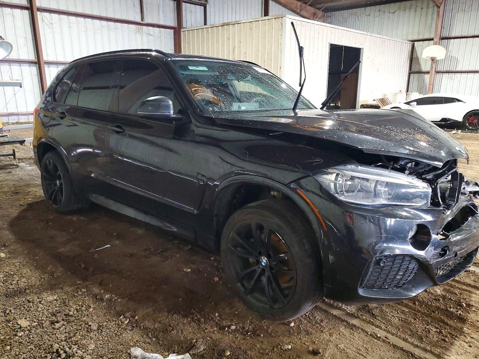 2014 BMW VIN 5UXKR0C54E0H18486 COPART salvage auction — FRONT END, TX - SALVAGE VEHICLE TITLE, sold $100 on 2026-07-27 (photo 4)
