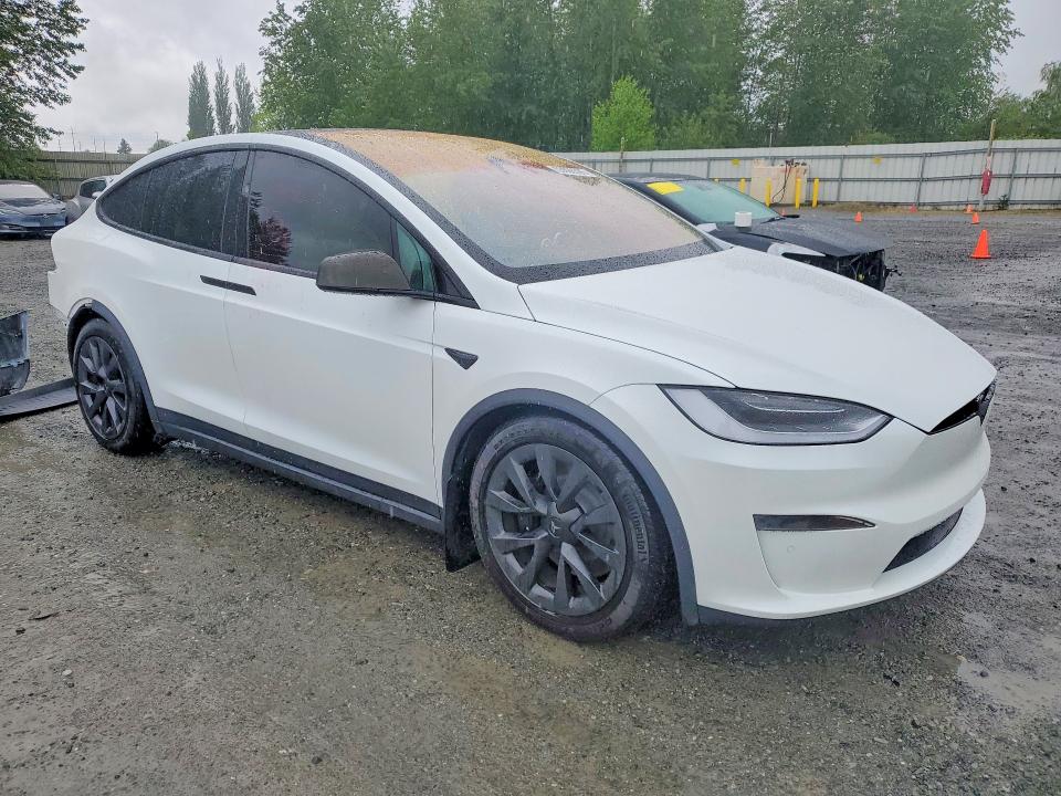 2023 Tesla VIN 7SAXCBE57PF365585 COPART salvage auction — REAR END, Salvage Title, sold $30,750 on 2026-07-13 (photo 4)