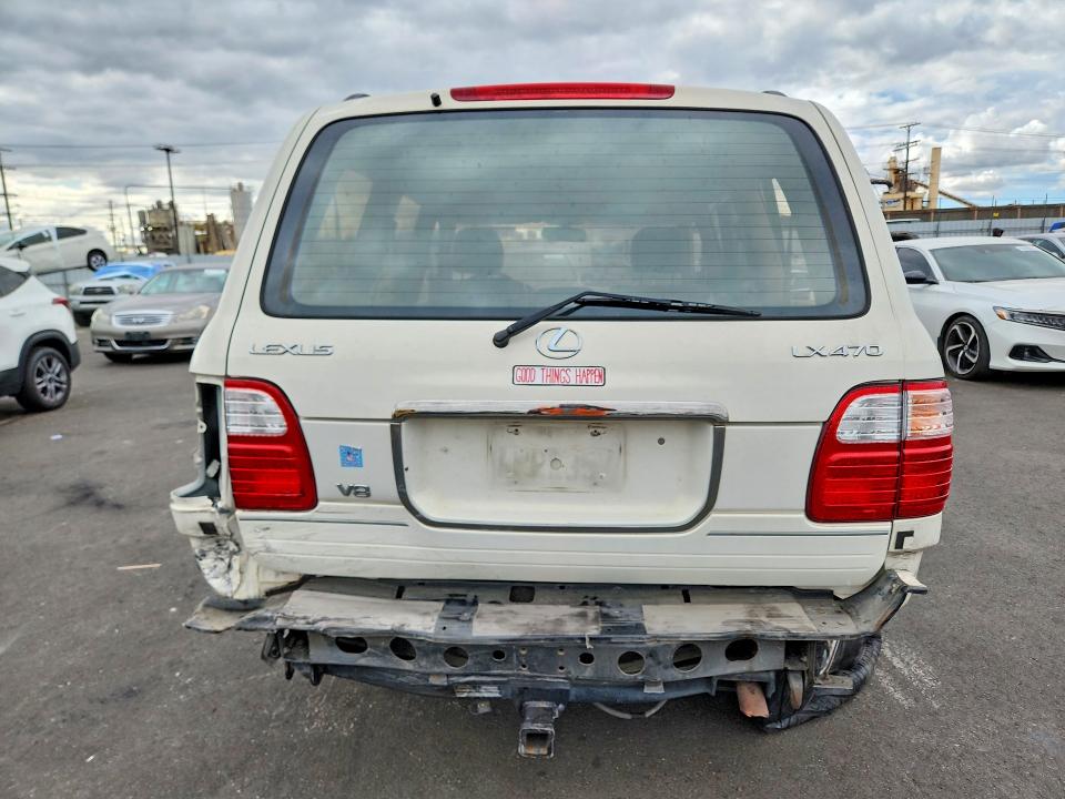 2000 Lexus Lx VIN JT6HT00W4Y0120384 COPART salvage auction — ALL OVER, Ca - Salvage Certificate, sold $925 on 2026-07-13 (photo 6)