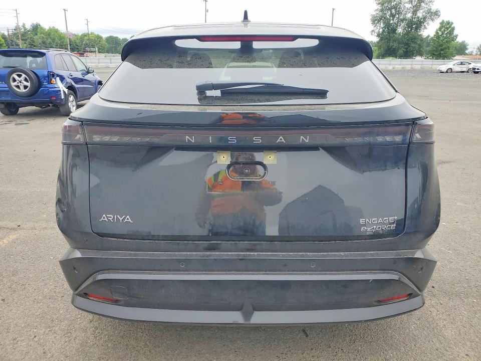 2025 Nissan VIN JN8DF0BF0SM765081 COPART salvage auction — SIDE, Or - Salvage Title Certificate, sold $13,300 on 2026-07-15 (photo 6)