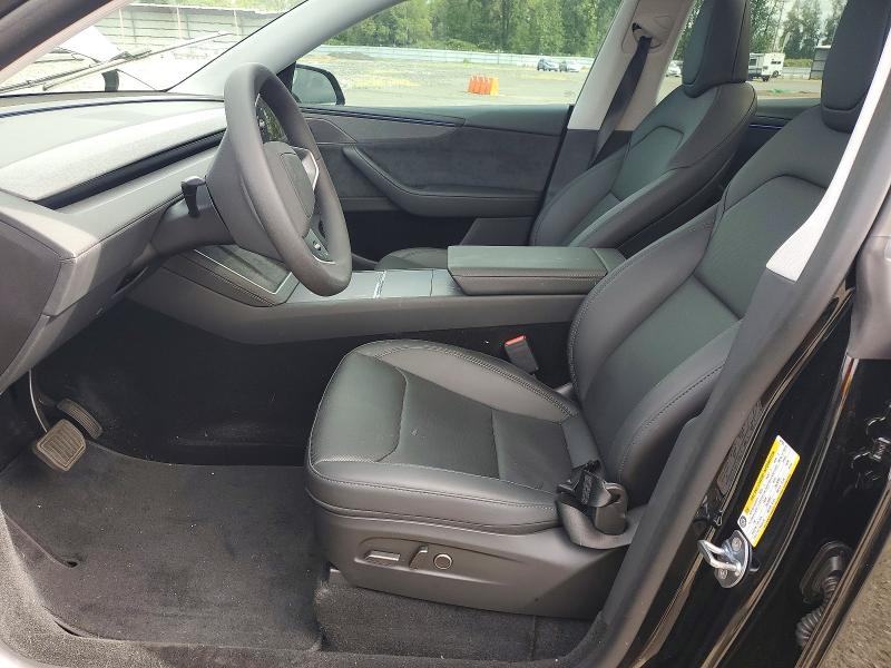 2026 Tesla Model y VIN 7SAYGDEE6TF567123 COPART salvage auction — REAR END, Or - Salvage Title Certificate, sold $18,100 on 2026-07-13 (photo 7)