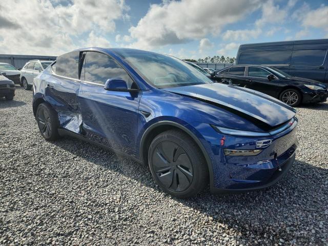 2026 Tesla Model y VIN 7SAYGDED5TF524612 COPART salvage auction — SIDE, Fl - Cert Of Title Slvg Rebuildable, sold $22,300 on 2026-07-10 (photo 4)
