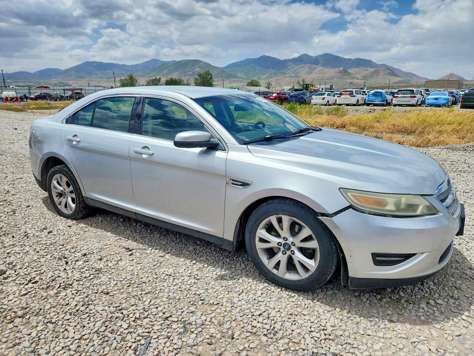 2011 Ford Taurus VIN 1FAHP2EW0BG185304 COPART salvage auction — MINOR DENT/SCRATCHES, Ut - Certificate Of Title, sold $350 on 2026-07-10 (photo 4)