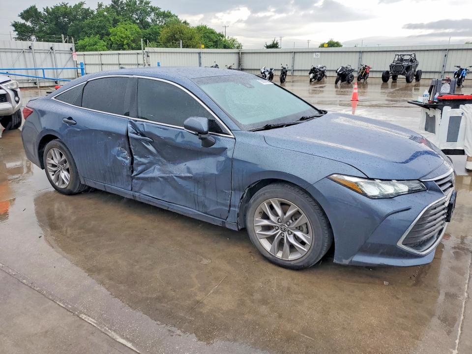2022 Toyota Avalon VIN 4T1JZ1FB2NU087095 COPART salvage auction — SIDE, TX - SALVAGE VEHICLE TITLE (P), sold $9,700 on 2026-07-23 (photo 4)