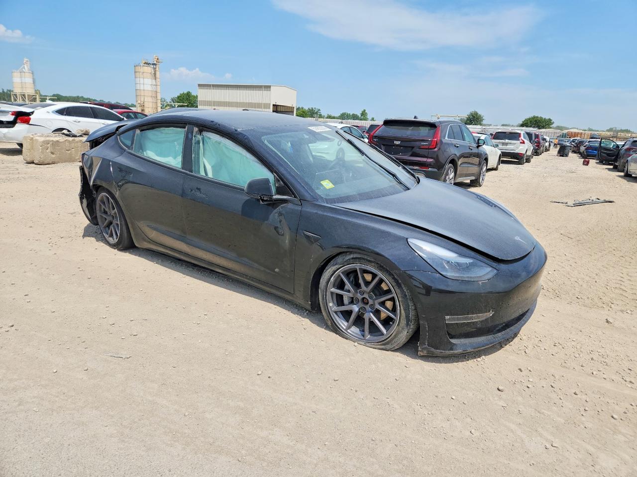 2022 Tesla Model 3 VIN 5YJ3E1EB2NF203544 COPART salvage auction — Side, KS - CERT OF TITLE-SALVAGE, sold $6,000 on 2026-07-09 (photo 4)
